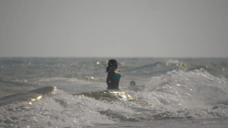 Gran-Canaria-island-Spain-view-of-woman-silhouette-against-stormy-Atlantic-Ocean