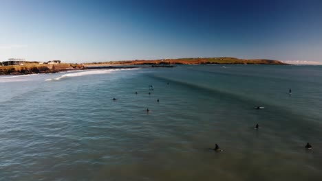 garretstown beach, cork, ireland, aerial view of surfers