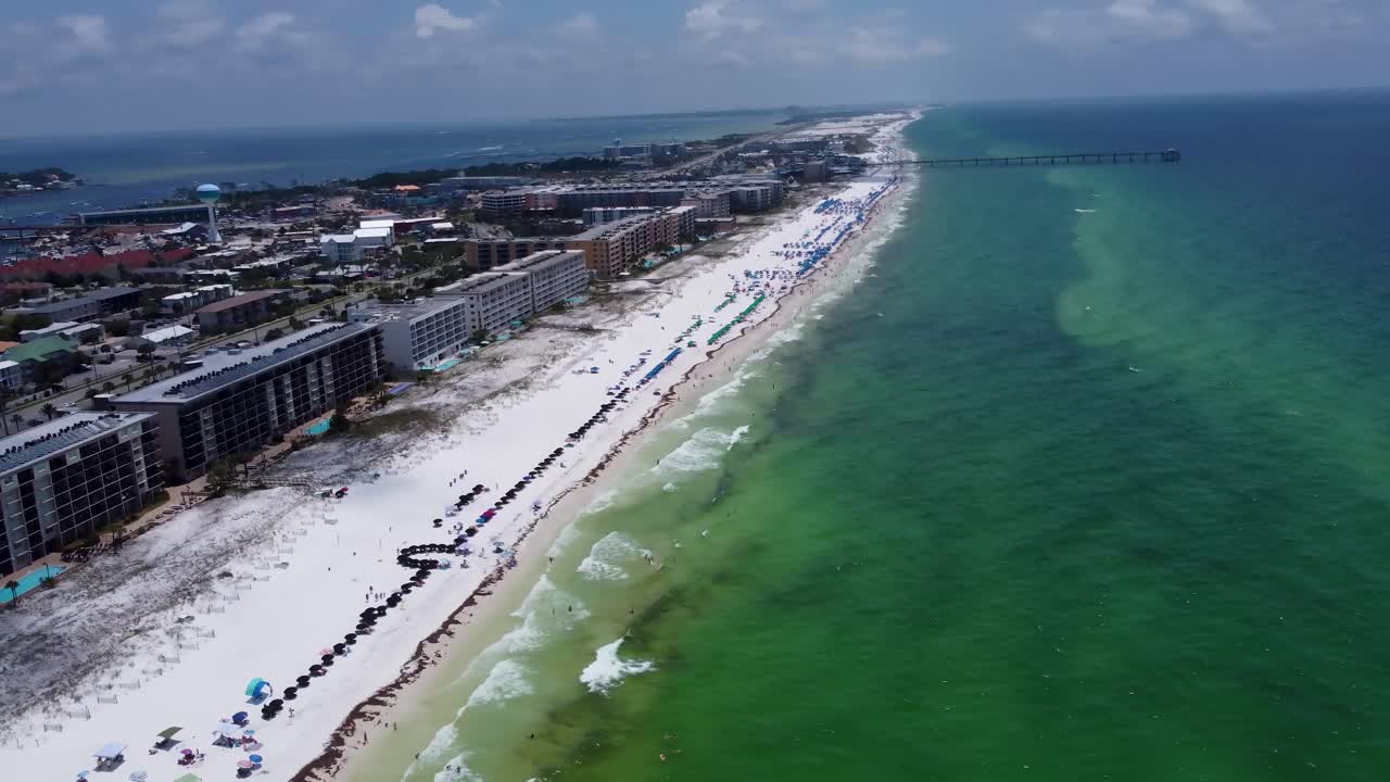 Aerial view of hotel Buildings resorts on fort Walton beach destin Florida. Waterfront beach Resort Rentals in Fort walton beach, Destin, Florida with okaloosa island pier in background, United States