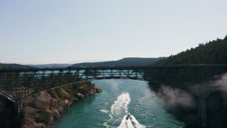 whidbey island at deception pass bridge - 4k drone pull back to boats