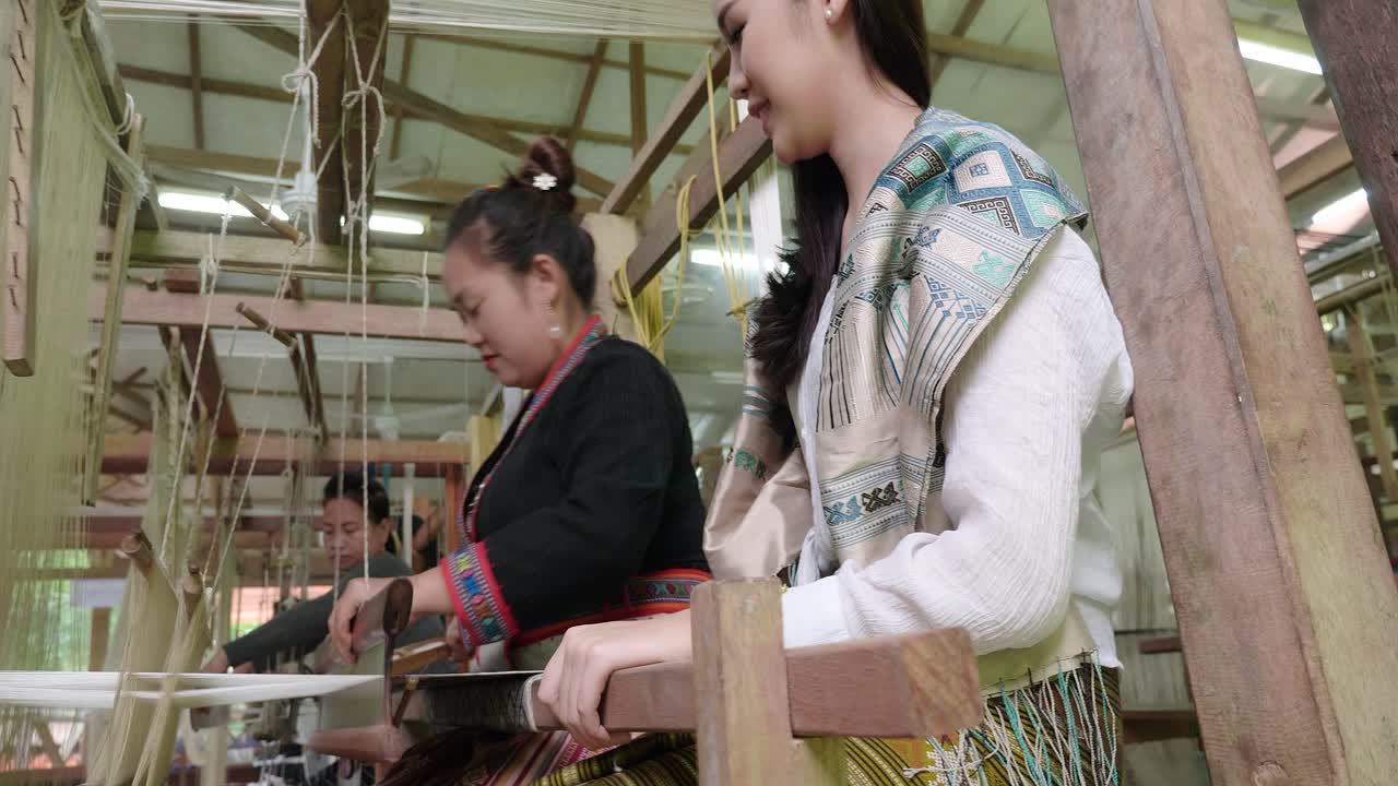 Women Weaving Traditional Thai/Lao Textiles