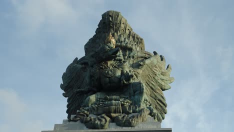 parallax shot from the large statue in gwk garuda-wisnu-kencana cultural park overlooking the gods of a religious memorial of balinese history during an exciting bali trip