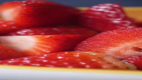 close-up of sliced strawberries in a bowl