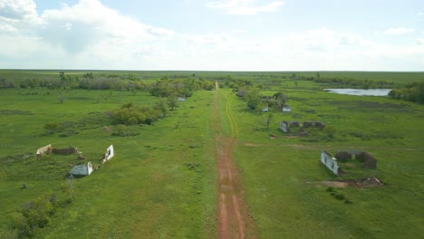 Green-Fields-And-Land-In-The-Countryside---Aerial-Drone-Shot