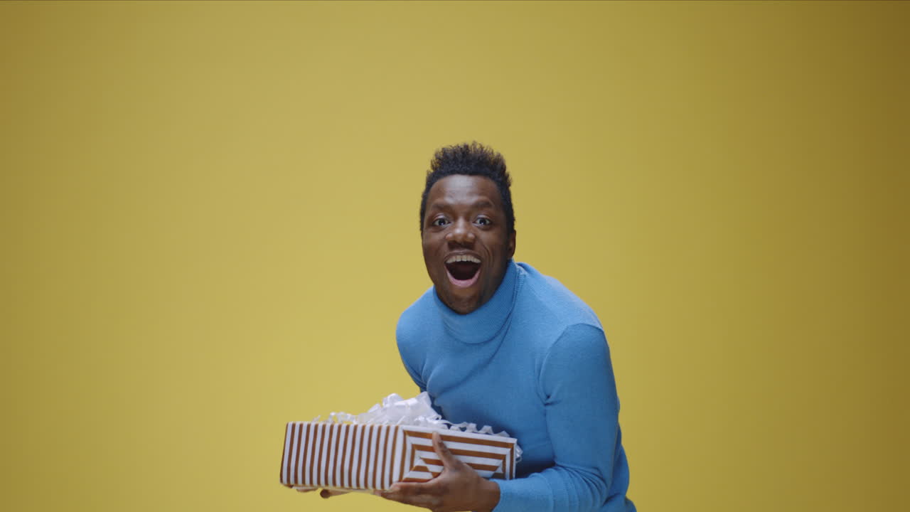 Man Reacts to Receiving a Gift Box