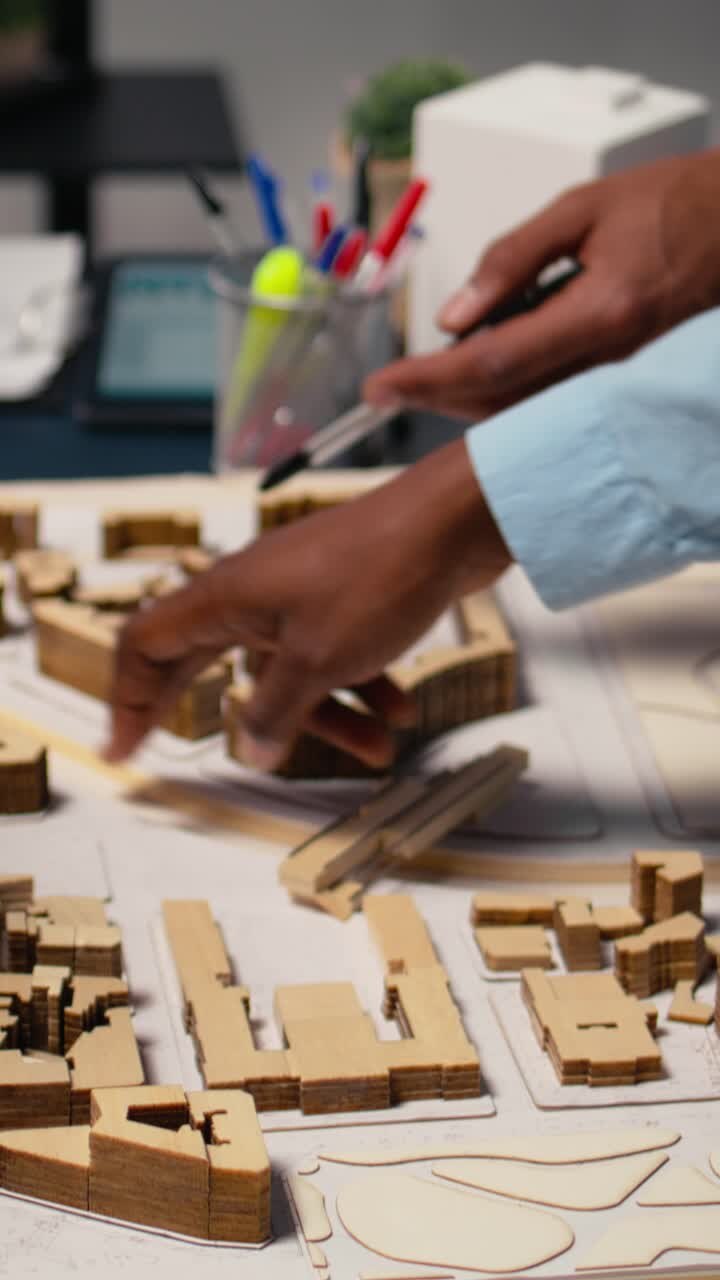 Vertical Video Close up of engineers team creating the property layout for site preparation