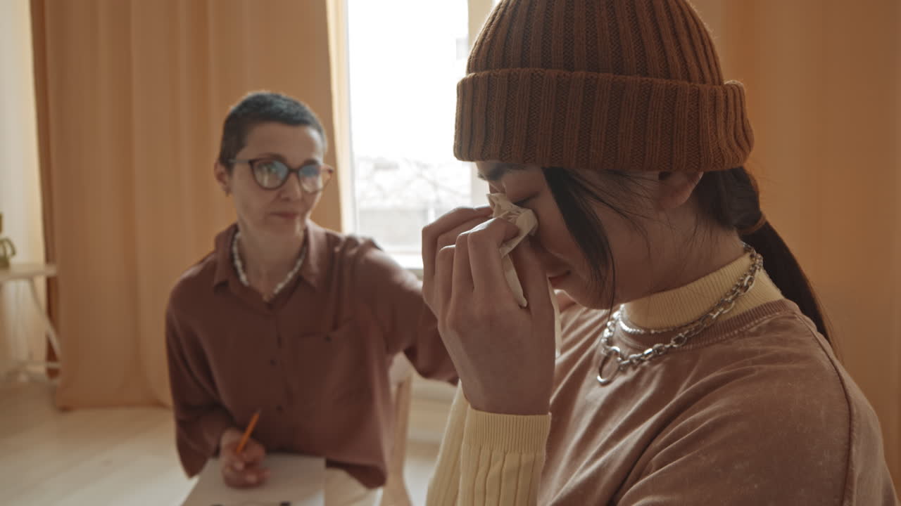 Therapy Session: Woman Receiving Emotional Support