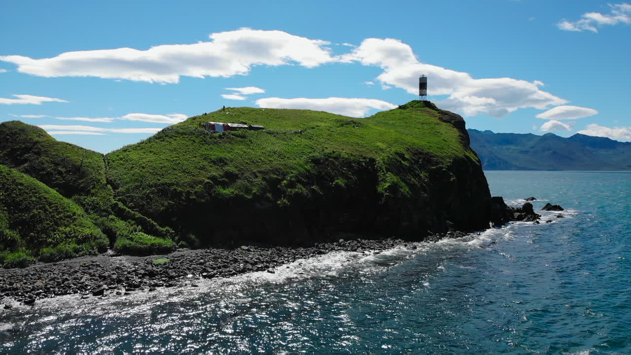 Coastal Landscape with Lighthouse and Cliffs