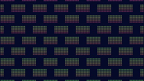 cuadrícula de puntos simétrica de colores sobre un fondo negro