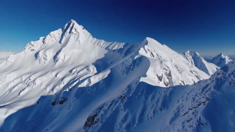 panoramic view of majestic snow-covered mountains