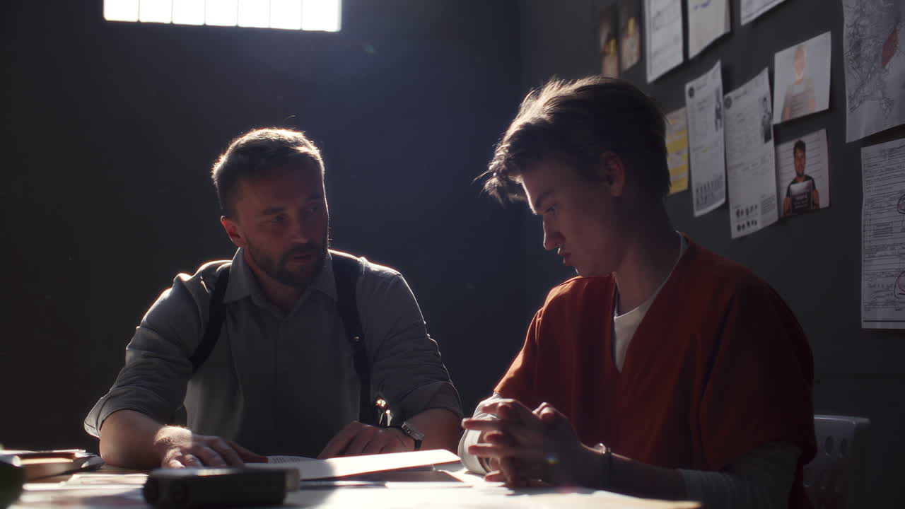 Female Inmate Denying Allegation during Interrogation by Officer