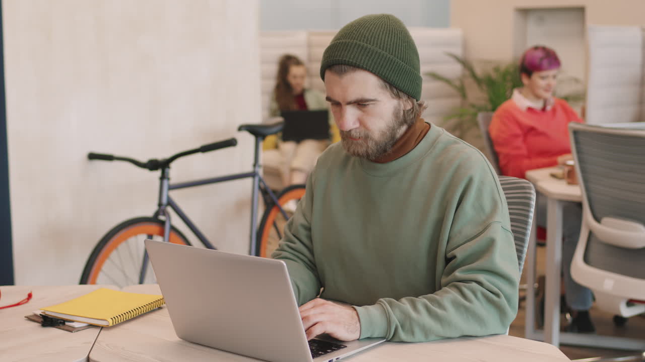 Hipster Businessman Working in Start-Up Office