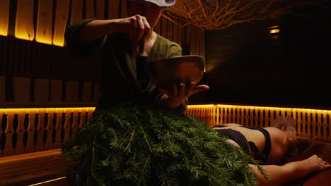 woman receiving sound healing session in a spa