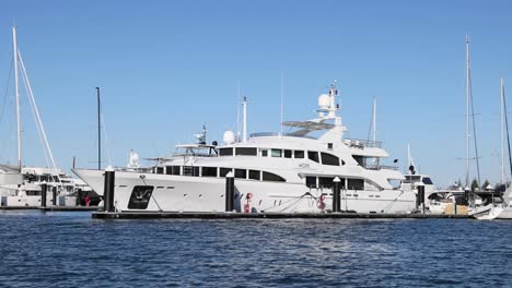 a yacht docked at a marina in gold coast