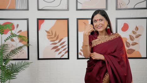 Indian-woman-pointing-for-product-placement