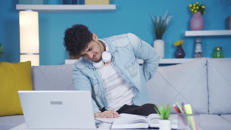college student suffering from back pain.