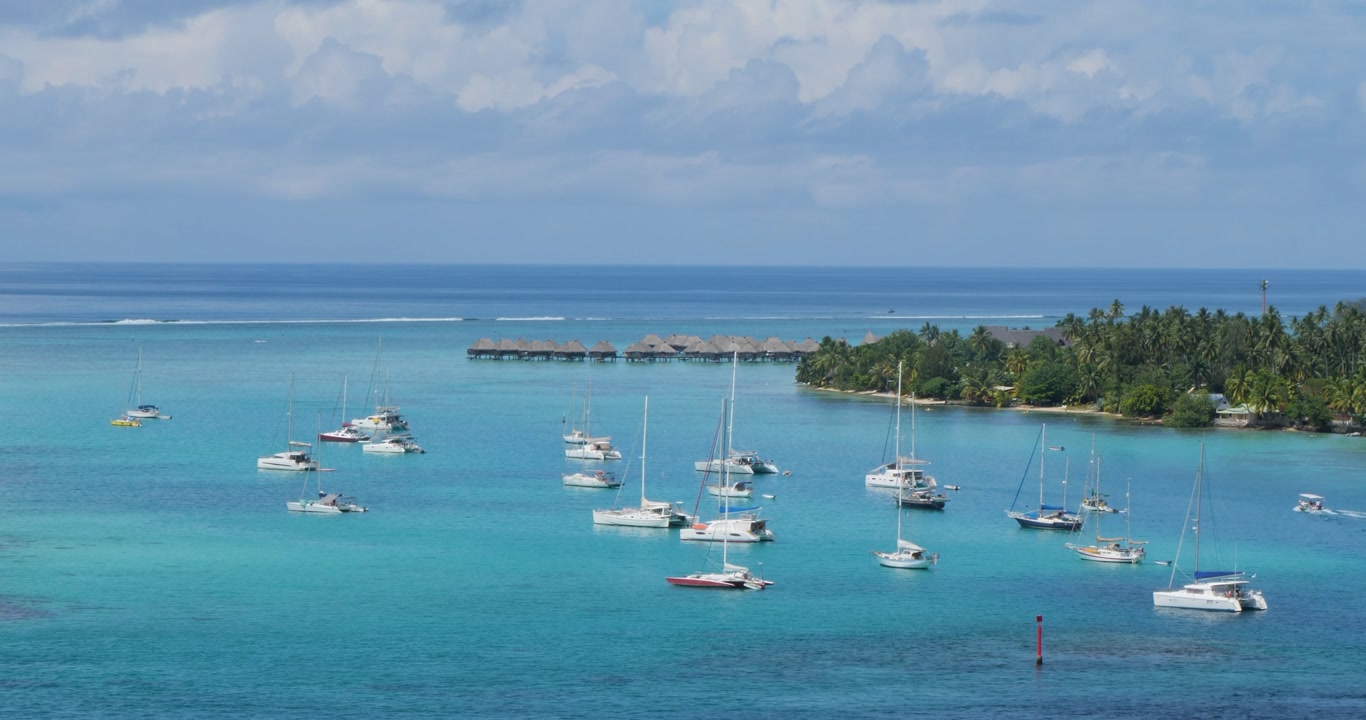 Yachts and sailboats in Opunohu Bay, Moorea, French Polynesia.
