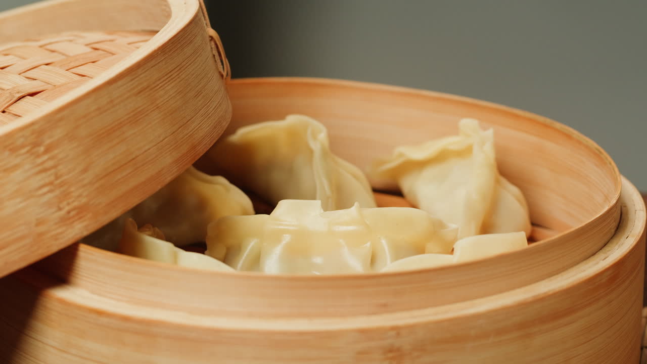Delicious Steamed Dumplings in a Traditional Bamboo Steamer