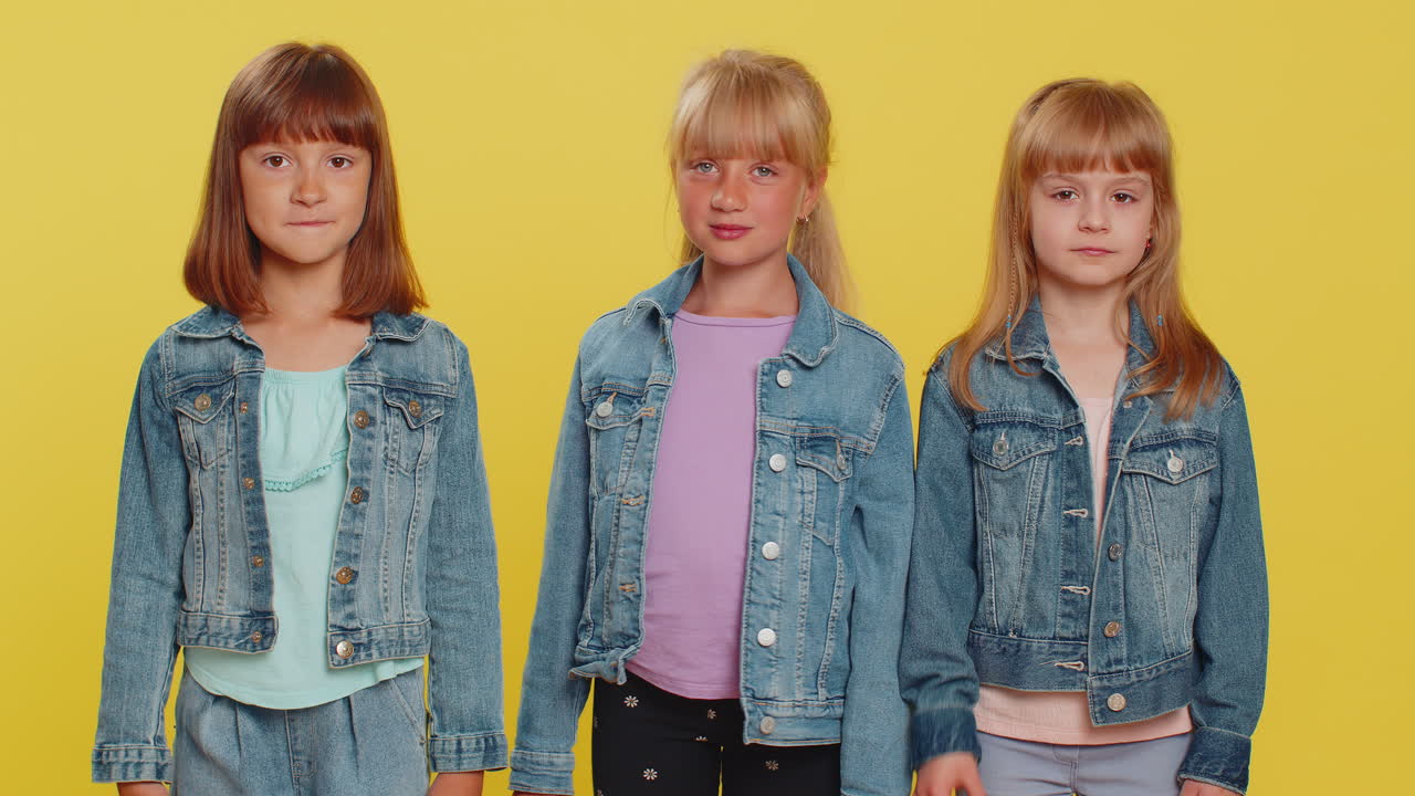 Three girls siblings friends showing ok gesture like sign positive approve something good okay
