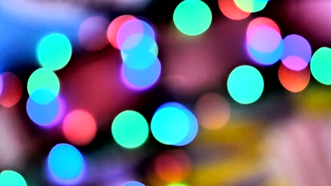luces de colores borrosos. rojo, verde, amarillo, naranja, azul desenfocado bokeh brillante fondo festivo.