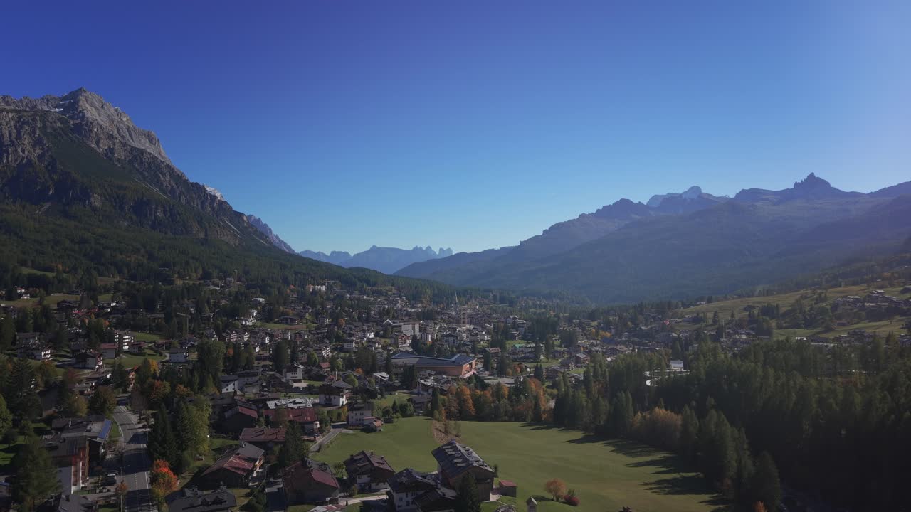 Aerial over Cortina d'Ampezzo valley Dolomite mountain Alpine resort