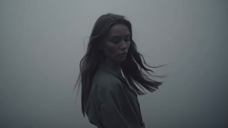 a woman's ethereal journey through dense fog
