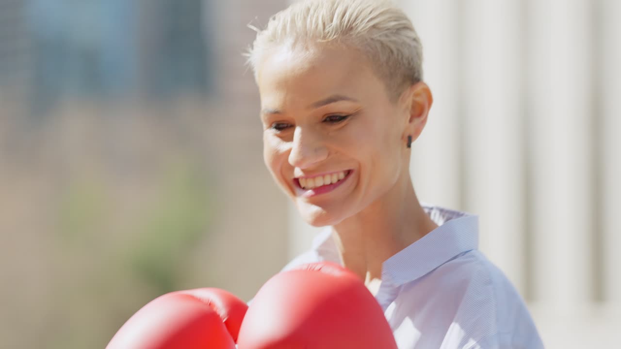 Smiling Woman with Red Boxing Gloves