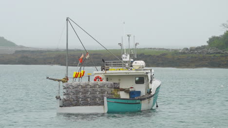 lobster fishing boat in marina with seagull flying slow motion hd 30p