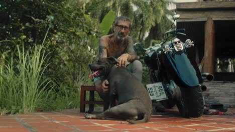 man, dog, and motorcycle