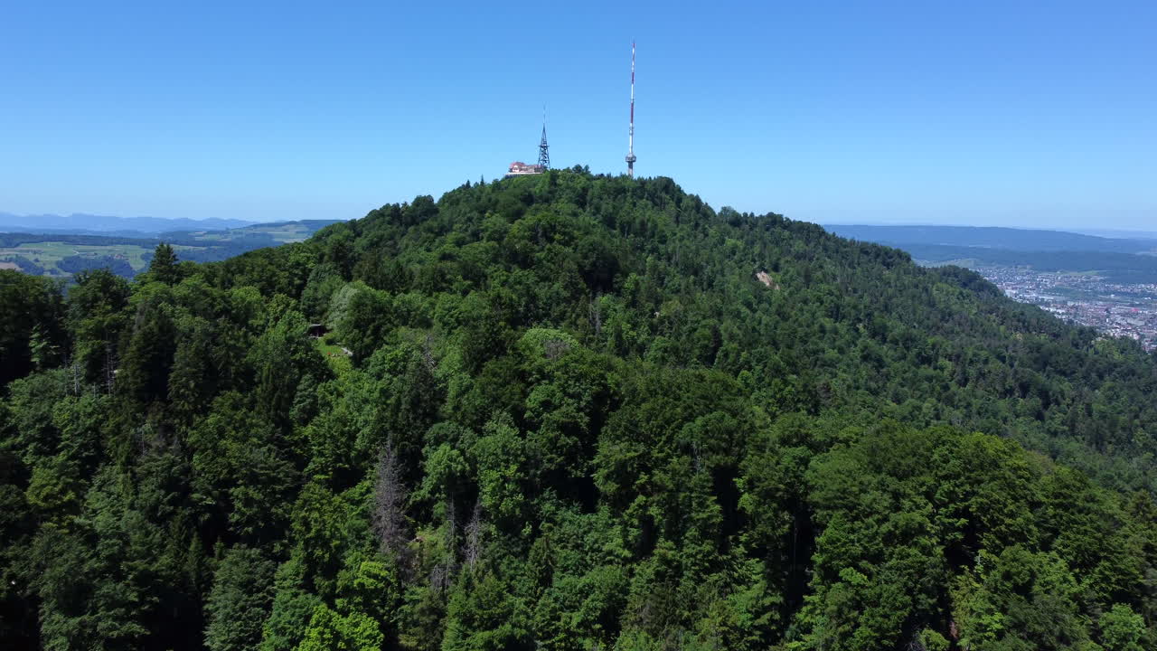 Telecommunication Tower Over Dense Mountain Of Uetliberg Near Zurich, Switzerland. Aerial Drone Shot