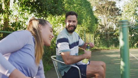 video of happy caucasian couple on having break the court