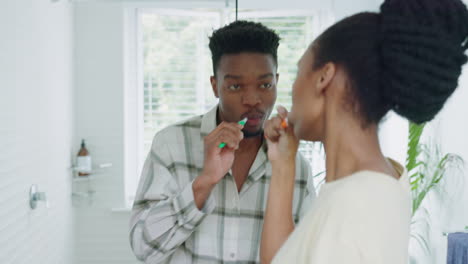 Dance,-brushing-teeth-and-black-couple-in-bathroom