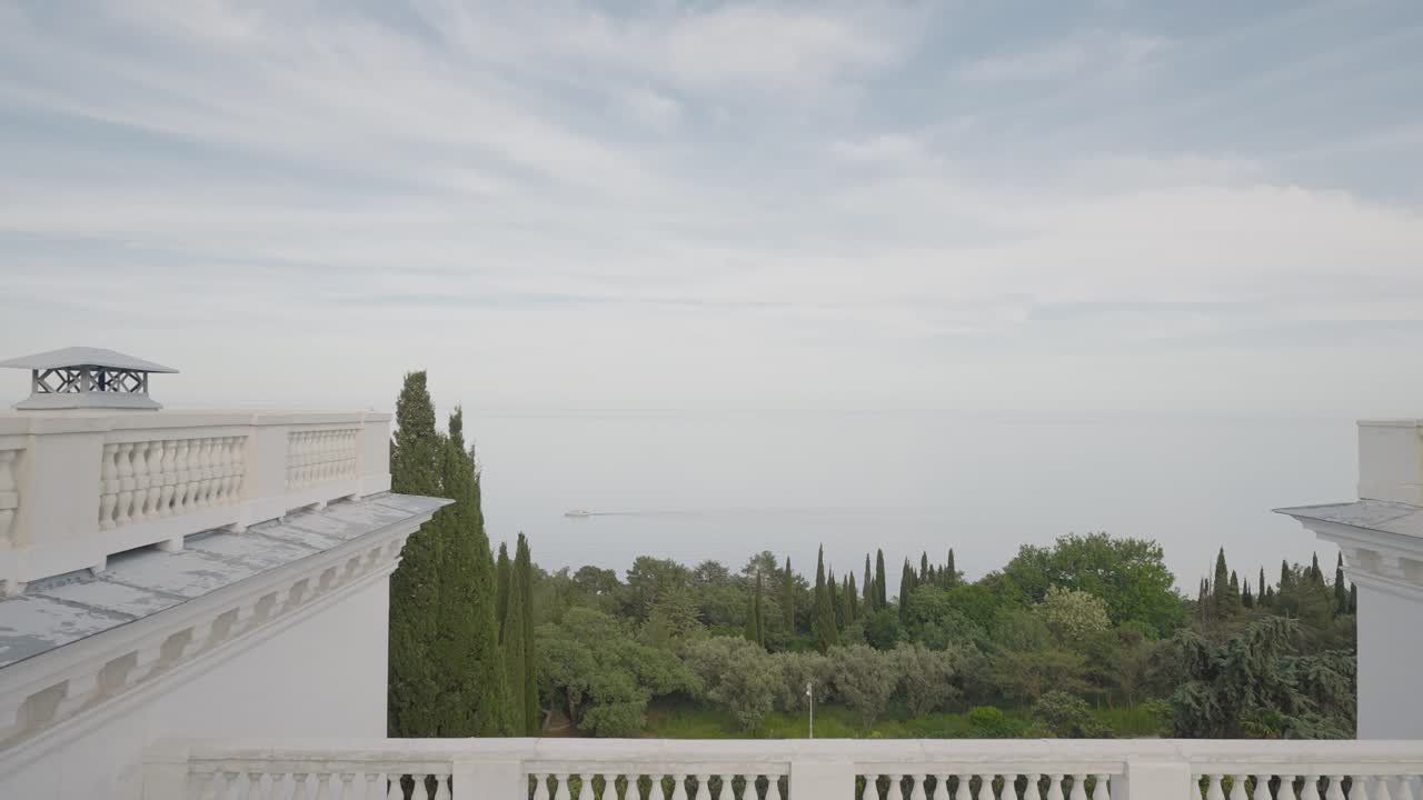 Panoramic View from a Balcony overlooking the Sea and Park