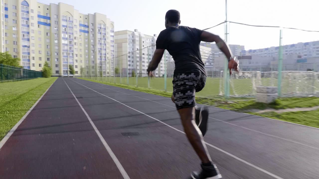 Man Running on a Track in the City