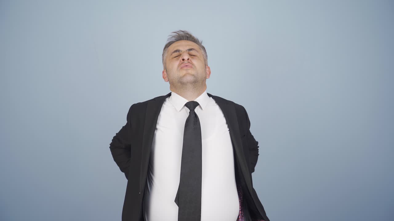 허리 통증이 있는 사업가입니다.