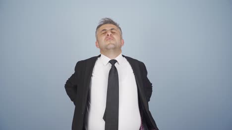 hombre de negocios con dolor de espalda.