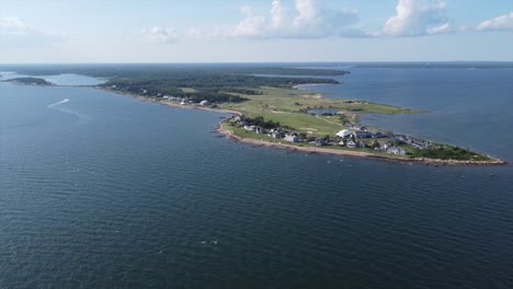 flying over seawater looking at peninsula