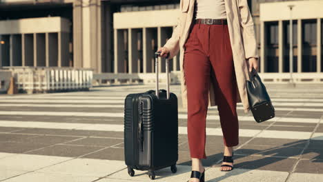 Legs,-woman-and-walking-with-suitcase-for-business