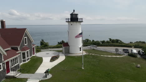 Nobska-Lighthouse-Stands-Tall-Near-The-Sea-At-Cape-Cod-On-A-Breezy-Day-In-Woods-Hole,-Massachusetts,-United-States