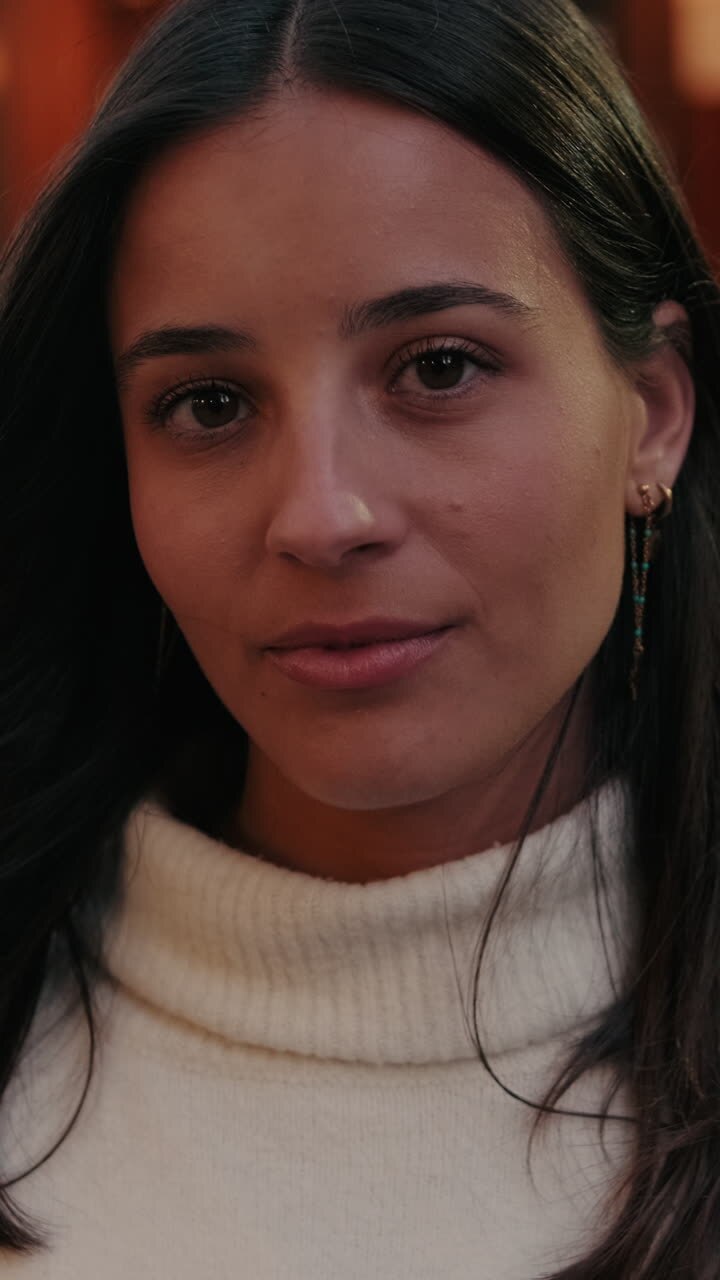 Woman in Seville Looks at Camera