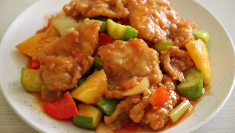 stir fried sweet and sour sauce with pork and vegetable