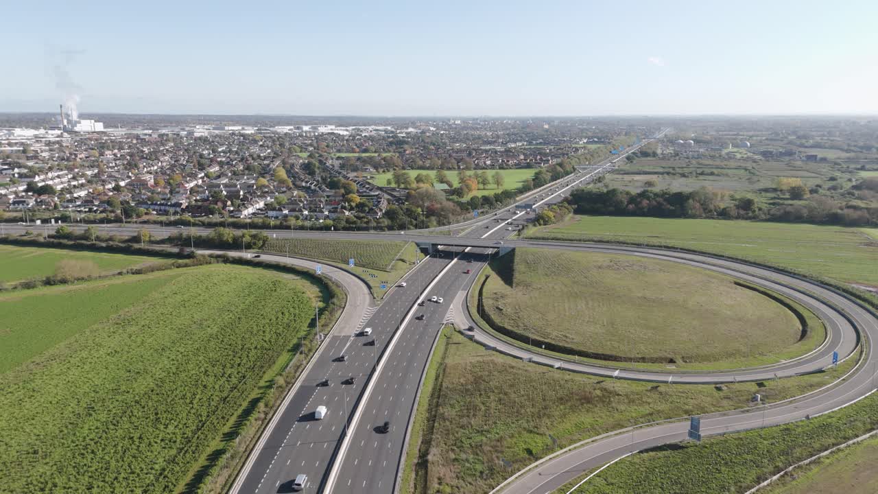 Aerial View of Highway Intersection and Surrounding Suburbs