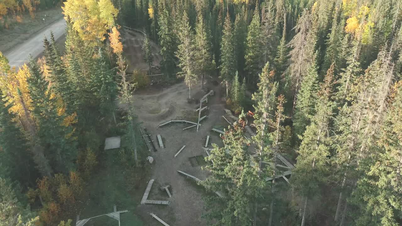 Drone going up to showcase a park in canada