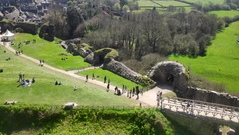 Slow-pan-of-Cofre-Castle,-showing-families-and-travelers-enjoying-the-facility