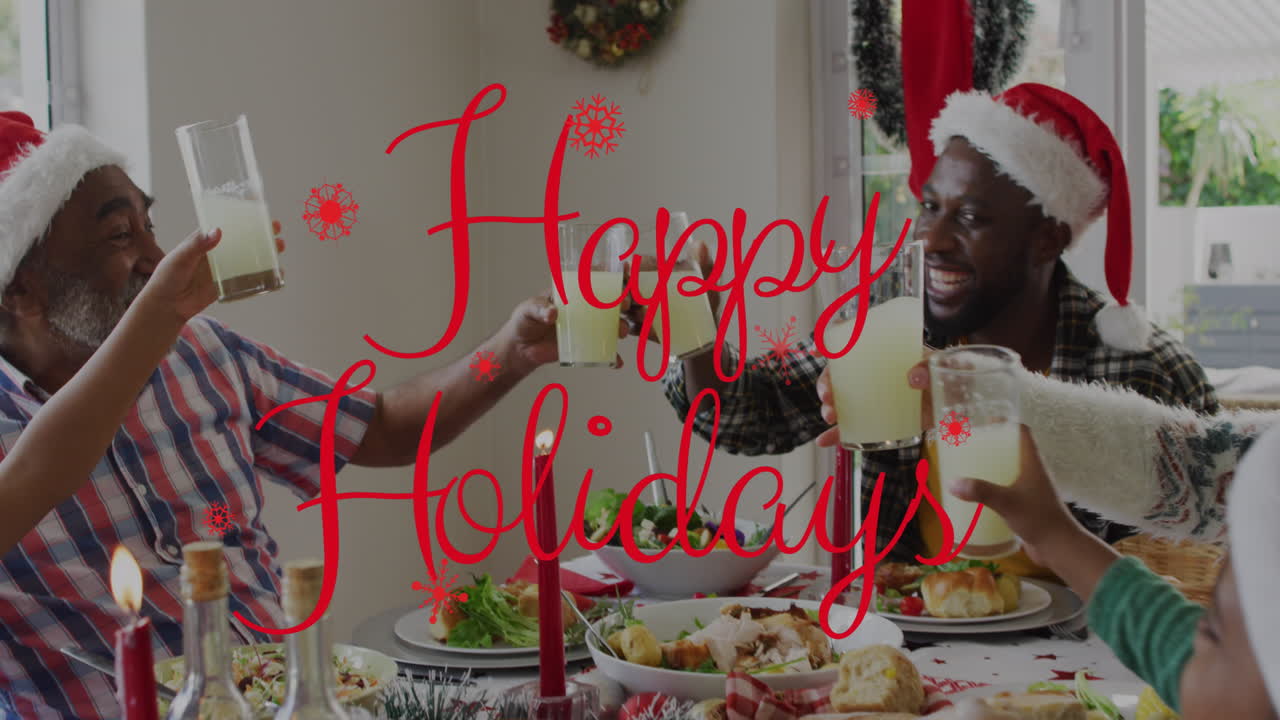 animación de saludos de navidad texto sobre familia afroamericana en la cena de navidad.