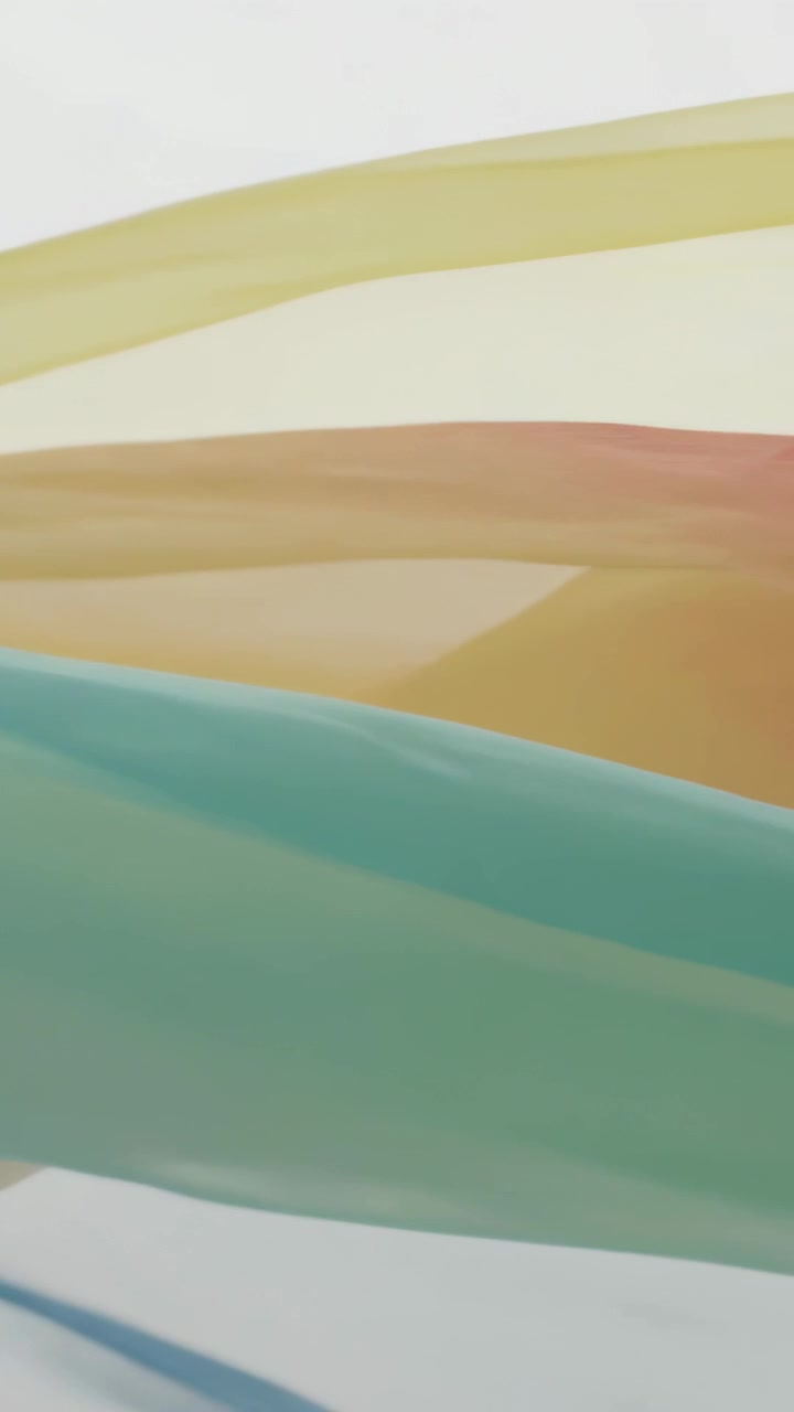 Vertical video: Play starting, translucent ribbons gliding on light backdrop forming pastel waves