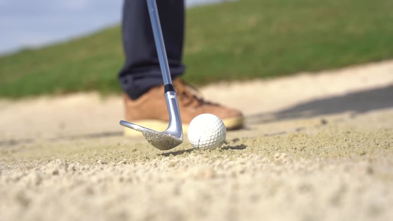 Golf ball in sand trap
