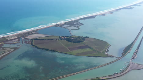 maguelone cathedral build on a nisthmus between a lake and the mediterranean sea