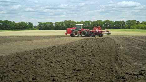 Rural-farming.-Plowed-land.-Agriculture-machinery.-Farming-tractor