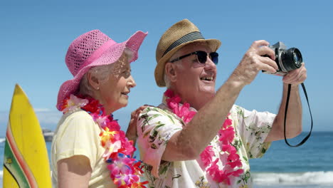 senior couple taking picture